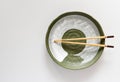 Wood Chopsticks on Ceramic plate green oriental style Royalty Free Stock Photo