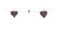 Wood clothes clip on white string line with two paper heart shape hang isolated on white background , clipping path for picture Royalty Free Stock Photo