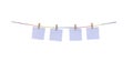 Wood clothes pins with paper hanging on colorful mulberry rope isolated on white background , clipping path Royalty Free Stock Photo