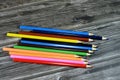 wood color pencils of different colors for painting isolated on wooden background, back to school concept, school supplies and Royalty Free Stock Photo