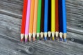wood color pencils of different colors for painting isolated on wooden background, back to school concept, school supplies and Royalty Free Stock Photo