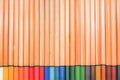 Wood colored pencils background Royalty Free Stock Photo