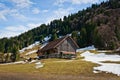 Wood cottage on foot of the hill