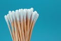 wood cotton buds isolated on blue background