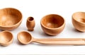wood craft (cups, bowl, spoons, scoops), cut out on white background Royalty Free Stock Photo