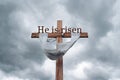 Wood cross on grey sky background. Good Friday, He is risen concept