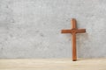 Wood cross on table background, pray for blessings from God. Christian Religion, Crucifix and Faith concept