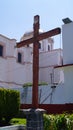 Wood crux outside of a church in mexico