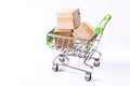 Wood cubes in shopping cart Royalty Free Stock Photo