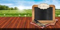 Cutting Board and Empty Blackboard on a Table with Text Chef Recommends Royalty Free Stock Photo