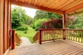 Wood deck with fence and pathed walkway. Royalty Free Stock Photo