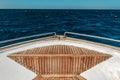 Wood deck prow of the yacht in the sea Royalty Free Stock Photo