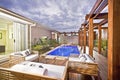 Wood decorated swimming pool area with swimming pool Royalty Free Stock Photo