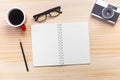 wood desk office with laptop, smartphone and other work supplies with cup of coffee. Top view with copy space for input the text. Royalty Free Stock Photo