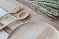 Wood dish and wood fork on wooden table.with Text Space