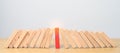 wood domino blocks falling on table. Crisis, fall Business, Risk management, Economic recession, Strategy and solutions concept Royalty Free Stock Photo