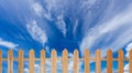 Wood fence and blue sky Royalty Free Stock Photo