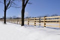 Wood fence by snow Royalty Free Stock Photo