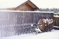 wood fence snow house garden winter cold day outdoors Royalty Free Stock Photo