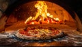 Wood-fired Pizza Baking in Traditional Oven with Flames Royalty Free Stock Photo