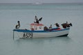 Anchored Fishing Boat in the Tropical Waters off Aruba Royalty Free Stock Photo