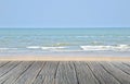 wood floor on sand beach with sea and blue sky beautiful natural tropical sea