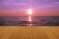 Wood floor on sea with purple sunset Burning Skie beautiful natural tropical sea Royalty Free Stock Photo