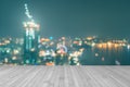 Wood floor terrace or wooden table with blur background rooftop perspective view city night light bokeh Royalty Free Stock Photo