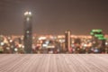 Wood floor terrace or wooden table with blur background rooftop perspective view city night light bokeh Royalty Free Stock Photo