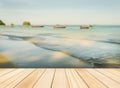 Wood floor top on blue sea in morning light Royalty Free Stock Photo