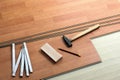 Wood flooring and tools Royalty Free Stock Photo