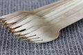 Wood forks in a heap lie on the fabric