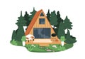 Wood A-frame house in forest. Summer building, holiday home of triangle shape. Modern wooden construction with