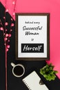 Wood frame with quote on pink and black background. Royalty Free Stock Photo