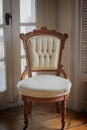 Wood Frame, Tufted Upholstery Vintage Chair Royalty Free Stock Photo