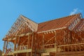 wood framework of new residential home under construction.