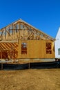 wood framework of new residential home under construction. Royalty Free Stock Photo