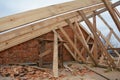 Wood framing during the roofing construction.Timber trusses, roof framing with a close-up of roof beams, struts and rafters Royalty Free Stock Photo