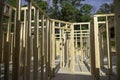 Wood framing studs at new home construction work site Royalty Free Stock Photo