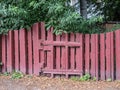 Wood gate to a neglected garden Royalty Free Stock Photo