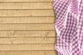 Wood and gingham background Royalty Free Stock Photo