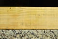 Pine wood, can be used as background, wood grain texture, on granite Royalty Free Stock Photo