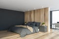 Wood and gray bedroom with home office Royalty Free Stock Photo