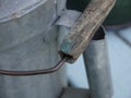 Wood Handle of Old Tin Watering Can Royalty Free Stock Photo