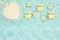 Wood heart with lace and teddy bears on pale teal rose plush fabric background