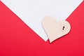 Wood heart on white and red background, copy space. valentine`s day card Royalty Free Stock Photo