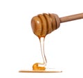 Wood honey dipper straining honey