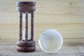 Wood hourglass countdown start the Earth Royalty Free Stock Photo