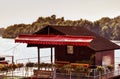 Wood house on Dunav River with red details, Belgrade, Serbia