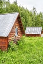 Wood house in forest. Local travel concept. Sustainable lifestyle. Summer